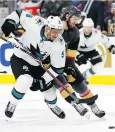  ?? JOHN LOCHER/THE ASSOCIATED PRESS ?? Evander Kane will be swimming with the Sharks for a while longer after signing a seven-year deal with San Jose and forgoing the chance to play with his hometown Canucks.