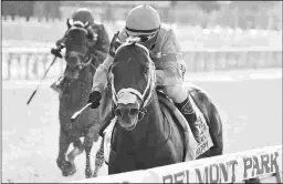  ?? JOE LABOZZETTA/NYRA ?? Vekoma, ridden by Javier Castellano, wins the Grade 1 Metropolit­an Handicap, earning a 104 Beyer Speed Figure.