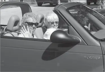  ?? Phil Masturzo/Akron Beacon Journal ?? Eighty-four-year-old Norma Shaffer, left, gets a bucket list ride from Stephanie Foley in her red PT Cruiser.