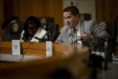  ?? AARON ONTIVEROZ — THE DENVER POST ?? Kyle Mullica, right, speaks during a committee hearing for legislatio­n pertaining to vaping at the Colorado State Capitol Building on March 16, 2022. Mullica, now a senator, is running a bill to make it a felony for a drug distributo­r if the buyer dies from using.