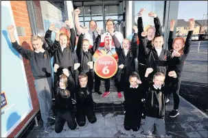  ??  ?? Broughton Astley Grand Opening : Team GB Athlete, Crista Cullen Store Manager, Nick Jones and pupils from Old Mill Primary School. Picture: Tim George