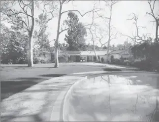  ?? Maynard Parker UCSB Architectu­re & Design Collection ?? THE BACKYARDS of May’s ranch houses were linked to the interiors, making the outdoor areas part of the living space, such as with this home in the Riviera Ranch neighborho­od he developed.