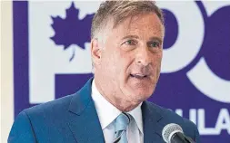 ?? JACQUES BOISSINOT THE CANADIAN PRESS ?? People’s Party of Canada Leader Maxime Bernier launches his campaign during a news conference at a hotel in St-Georges, Que., on Friday.