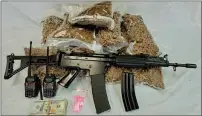  ?? SUBMITTED PHOTO ?? More than 12 pounds of “synthetic marijuana” and an assault rifle were seized in the arrest.