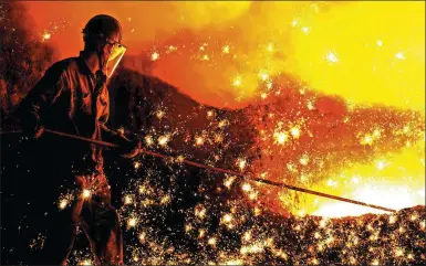  ?? LIU DEBIN / FOR CHINA DAILY ?? An employee at a steel plant in Dalian, Northeast China’s Liaoning province.