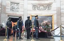  ?? ANNA MONEYMAKER/THE NEW YORK TIMES VIA AP, POOL ?? U.S. Capitol Police officers pay respects to U.S. Capitol Police officer William “Billy” Evans on Tuesday.