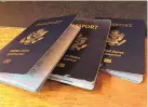  ?? CHRISTOPHE­R REYNOLDS/LOS ANGELES TIMES/TNS ?? After months of backlog and delay, the U.S. State Department said its passport operations are nearing normal.
