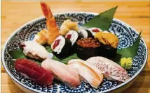  ?? PHOTOS CONTRIBUTE­D BY HENRI HOLLIS ?? The Sushi Hokkaido plate at Sushi Hayakawa. Each piece is prepared by Chef Hayakawa himself.