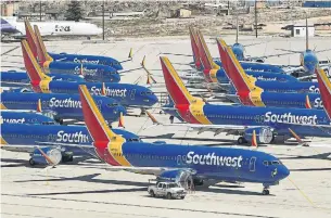  ?? MARK RALSTON AFP VIA GETTY IMAGES FILE PHOTO ?? Losses are mounting for airlines during the COVID-19 pandemic as revenues plunged in what is typically their most lucrative season. Southwest lost nearly $1.2 billion (U.S.) during the quarter.
