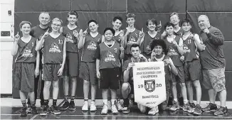  ?? CONTRIBUTE­D ?? The Dr. W.A. MacLeod Coyotes capped their season with the Northumber­land regional championsh­ip recently. Shown following the title game in Kennetcook holding the banner are Dakota Fitt, left, and Keinon DeCoste. Standing from left are: Luke Burns, assistant coach Ray Burns, Tanner MacGregor, Aiden Pellerine, Brett Stroud, James Bohol, Braeden McKay, Nathan Grant, Keagen MacMaster, Joey Bryce, Jaxon Hughes, Aaron MacLeod, and head coach Nick Irvine. Missing from the photo is assistant coach Mark Stroud.