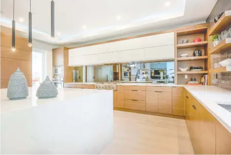  ?? PHOTOS: HOMETOWN HEROES LOTTERY ?? The $2.7 million prize home in White Rock is loaded with high-end features, including a full designer kitchen.