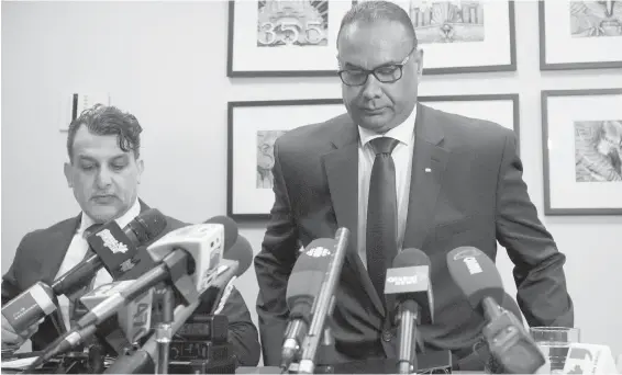  ?? JONATHAN HAYWARD, THE CANADIAN PRESS ?? Jaspal Atwal, right, with his lawyer Rishi T. Gill, at a news conference in downtown Vancouver on Thursday.