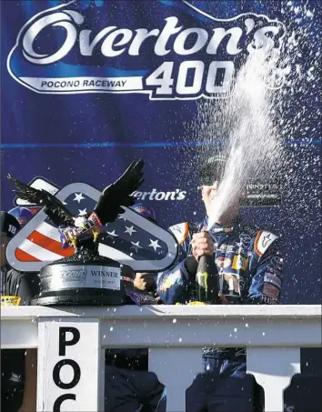  ?? Jeff Zelevansky/Getty Images ?? The reduced weekend Cup schedule at Pocono Raceway didn’t prevent Kyle Busch from claiming first place Sunday.