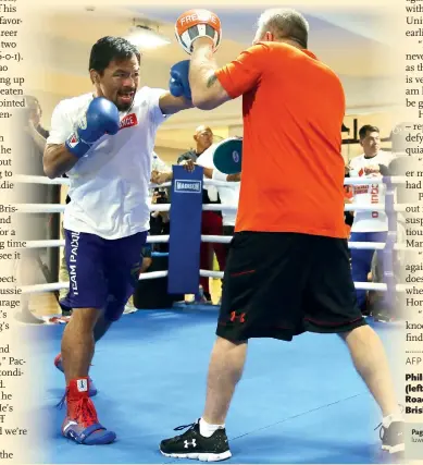  ?? Photo: IC ?? Philippine boxer Manny Pacquiao (left) spars with his trainer Freddie Roach during a training session in Brisbane on Tuesday.