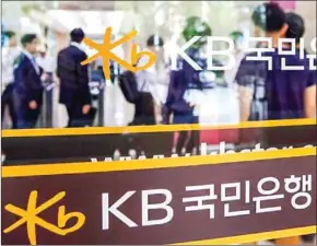  ?? YONHAP NEWS AGENCY ?? KB Kookmin acquired a 70 per cent stake in Cambodian affiliate Prasac worth $630 million in April and plans to turn it into a subsidiary after buying the rest of the stake soon.