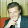  ??  ?? Roger Moore