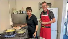  ?? SUPPLIED ?? Volunteers Vicki McLeod, left, and husband Alistair McLeod help out at last year’s Christmas community breakfast at Blenheim’s John’s Kitchen.