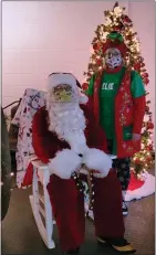  ?? SUBMITTED PHOTO ?? Santa and one of his elves made an appearance at the Hamburg fire station on Dec. 12. Santa returns on Dec. 19, from 5 to 8 p.m. and then rides through town on Dec. 20 at 4 p.m.