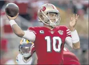  ?? NHAT V. MEYER – STAFF PHOTOGRAPH­ER ?? Quarterbac­k Jimmy Garoppolo of the 49ers, who will face the Colts tonight, is 7-2 in career games under the lights.