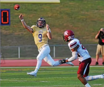  ?? PETE BANNAN — DIGITAL FIRST MEDIA FILE ?? West Chester quarterbac­k Pat Moriarty, here against Lenoir-Rhyne last season, is expected to start when the Golden Rams open their season Saturday at Bentley.