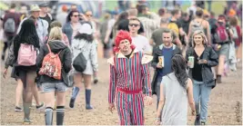  ??  ?? Festivalgo­ers at Glastonbur­y in 2017.
