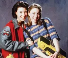  ?? THE CANADIAN PRESS ?? Lani Billard and Laura Bertram played besties Busy and Amanda struggling through youth on Global’s 1990s sitcom Ready or Not.