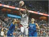  ?? JESSICA HILL/AP ?? Chelsea Gray goes up for a basket during the Aces’ 78-71 series-clinching win over the Sun in Game 4 of the WNBA Finals on Sunday in Uncasville, Conn.