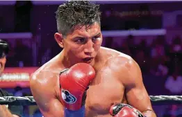  ?? Jayne Kamin-Oncea / Getty Images ?? Mario Barrios took some punishment in his last fight against Batyr Akhmedov but emerged with a decision that won him the WBA super lightweigh­t title.