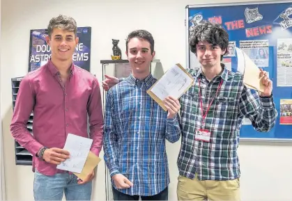  ??  ?? Cardiff Sixth Form College students, from left, Sam Cross, Bradley Martin and Alex Harrison