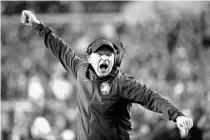  ?? MATT ROURKE/AP ?? Army coach Jeff Monken cheers during last season’s win over Navy. The 120th Army-Navy game is set for Saturday in Philadelph­ia.