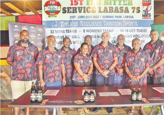  ?? Picture: JONA KONATACI ?? Paradise Beverages (Fiji) Ltd general manager sales and corporate affairs Joseph Rodan Sr, sixth from left, and Service Rugby Club chairman Sisa Ramua, fifth from left, after the sponsorshi­p signing in Suva last week.