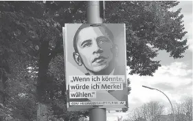  ?? GRIFF WITTE / THE WASHINGTON POST ?? Campaign posters for the Christian Democratic Union featuring the image of former U.S. president Barack Obama have gone up in Berlin. The posters emphasize Obama’s support for German Chancellor Angela Merkel, who is seeking a fourth term.
