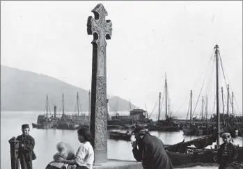  ??  ?? A 19th century photograph of the Inveraray cross, which is commonly believed to have been moved from the demolished old town of Inveraray in the 1830s.