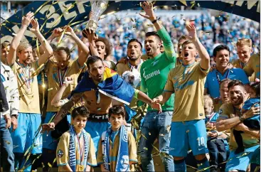  ??  ?? WINNING FORMULA: Zenit St Petersburg celebrate one of their five Russia Premier League titles in ten years