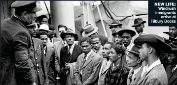  ??  ?? NEW LIFE: Windrush immigrants arrive at Tilbury Docks