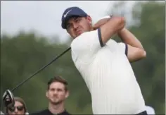  ?? RYAN MICHALESKO - THE ASSOCIATED PRESS ?? Brooks Koepka tees off on the first hole during the first round of the Byron Nelson golf tournament Thursday, May 9, 2019, at Trinity Forest in Dallas.