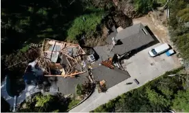  ?? Photograph: Jae C Hong/AP ?? An aerial view of the property damaged by a landslide on Wednesday, 13 March 2024.