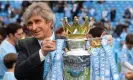  ?? Andrew Yates/AFP/Getty Images ?? Pellegrini with the Premier League trophy after City’s triumph in 2014. Photograph: