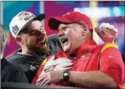  ?? MATT SLOCUM / AP ?? Kansas City Chiefs head coach Andy Reid, right, and Travis Kelce (87) celebrate their win after the NFL Super Bowl LVII football game on Sunday in Glendale, Ariz.