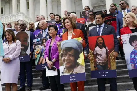  ?? J. Scott Applewhite/Associated Press ?? From left, Rep. Veronica Escobar, D-Texas, Rep. Judy Chu, D-Calif., House Speaker Nancy Pelosi of Calif., Rep. Jimmy Gomez, D-Calif., and Rep. Carolyn Maloney, D-N.Y., attend an event on the steps of the U.S. Capitol about gun violence on Friday.