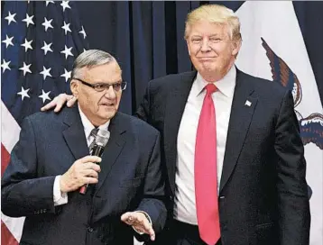  ?? MARY ALTAFFER/AP 2016 ?? President Trump’s pardon of Joe Arpaio, left, looked like “a test run” for stopping the Russia probe, one legal expert says.