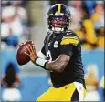  ?? Jacob Kupferman / Associated Press ?? Steelers quarterbac­k Dwayne Haskins plays against the Panthers during the preseason in August. Haskins was killed in an auto accident Saturday in Florida.