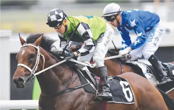  ?? Picture: AAP IMAGE ?? Jockey Kerrin McEvoy rides Tangled to win the Group 2 Champagne Classic at Doomben in May.