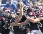  ?? SAM CRAFT/AP ?? Texas A&M kicker Seth Small (47) celebrates his game-winning field goal with teammates.