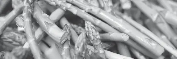  ?? ALLEN MCINNIS ?? To store asparagus, trim a little off the end of the stalks, then stand the stalks up in some water (covered loosely with a plastic bag) in the fridge.