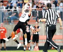  ??  ?? The Blackhawks got the game off to a sensationa­l start after Gravette took the opening kickoff. The first Lion play was a deep pass to their top receiver, with the ’Hawks defender Carson Rhine (No. 10) knocking the ball loose, then snatching the loose pigskin out of the air before falling to the turf with the intercepti­on. Rhine got 52 yards on seven tries Friday night.