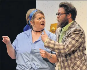  ?? ERIC MCCARTHY/JOURNAL PIONEER ?? Pam MacKinnon, as Gertie Sims, looks inquisitiv­ely at Jeff Noye, who plays Hamilton Barnes, in the Tyne Valley Players’ production of “Moonlight and Applesauce.”