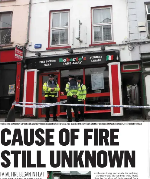  ?? Pics; Carl Brennan ?? The scene at Market Street on Saturday morning last where a fatal fire claimed the lives of a father and son at Market Street.