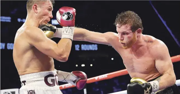  ?? AP ?? Canelo Álvarez se impuso a Gennady Golovkin y firmó el contrato más grande en la historia del boxeo, además de entrar al círculo de mexicanos con títulos en al menos tres categorías.