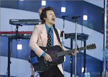  ??  ?? Harry Styles, shown performing for the “Today” show in February 2020, will open the 2021 Grammy Awards Sunday. ANTHONY BEHAR/SIPA USA